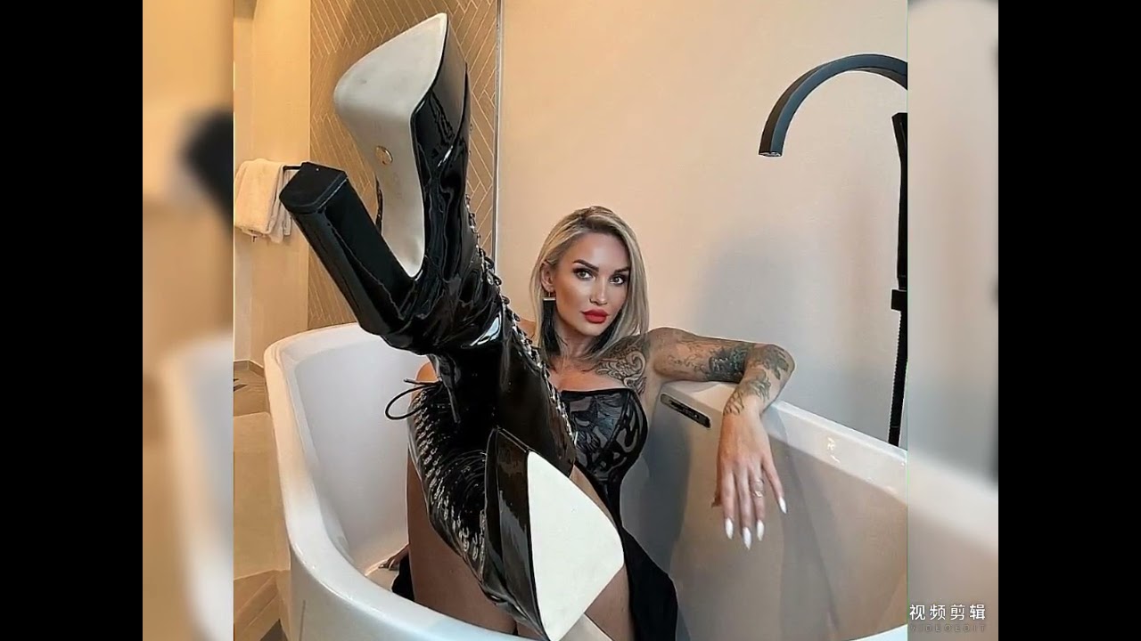 Flirty babe dressed in impressive patent leather boots & eye-catching outfits