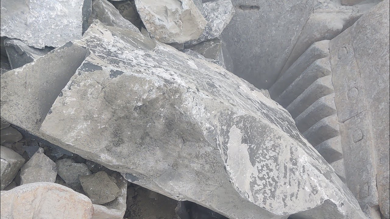 Manual Stone Feeding in Crusher Machine: Workers vs Giant Stone in Crusher