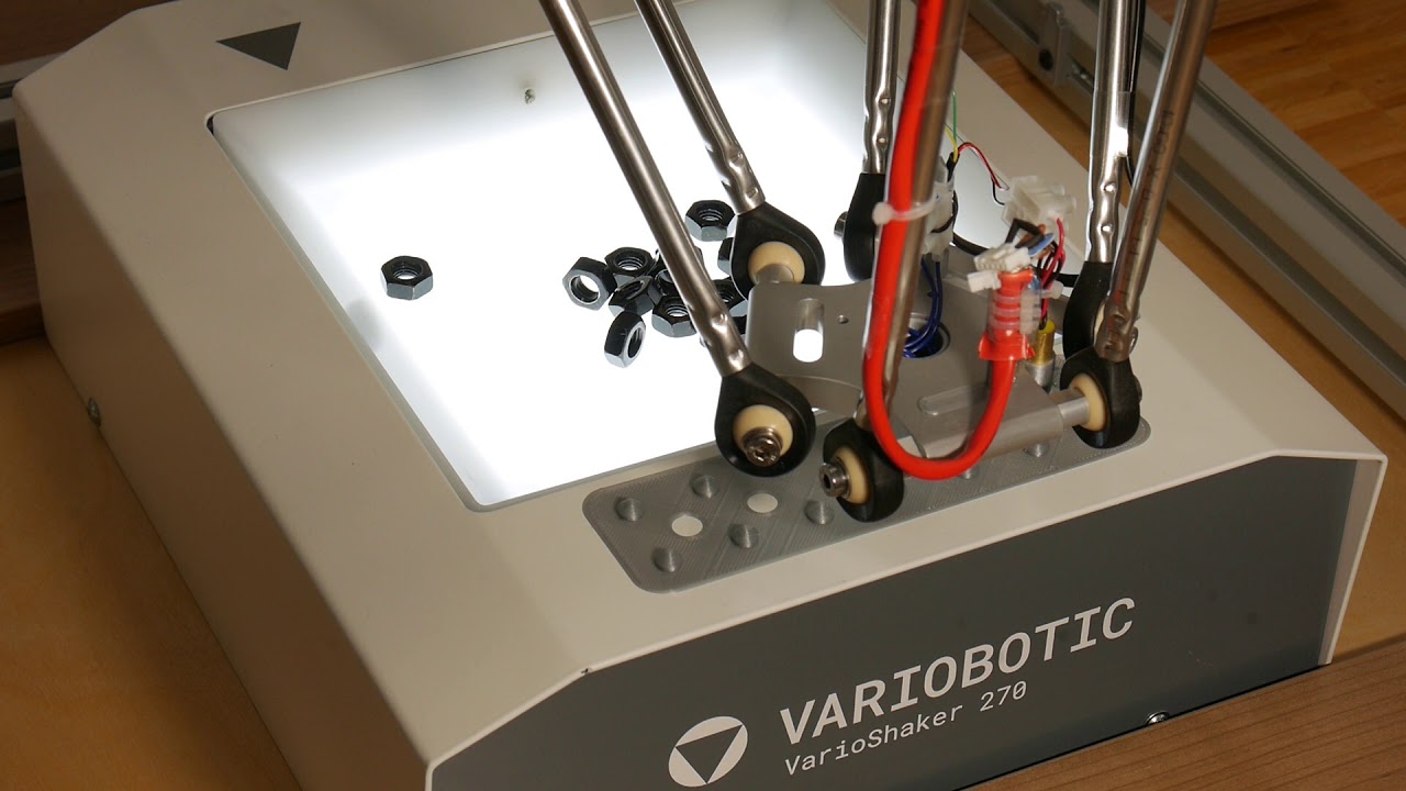 Picking parts from a shaker with a low-cost robot using an open source vision library.
