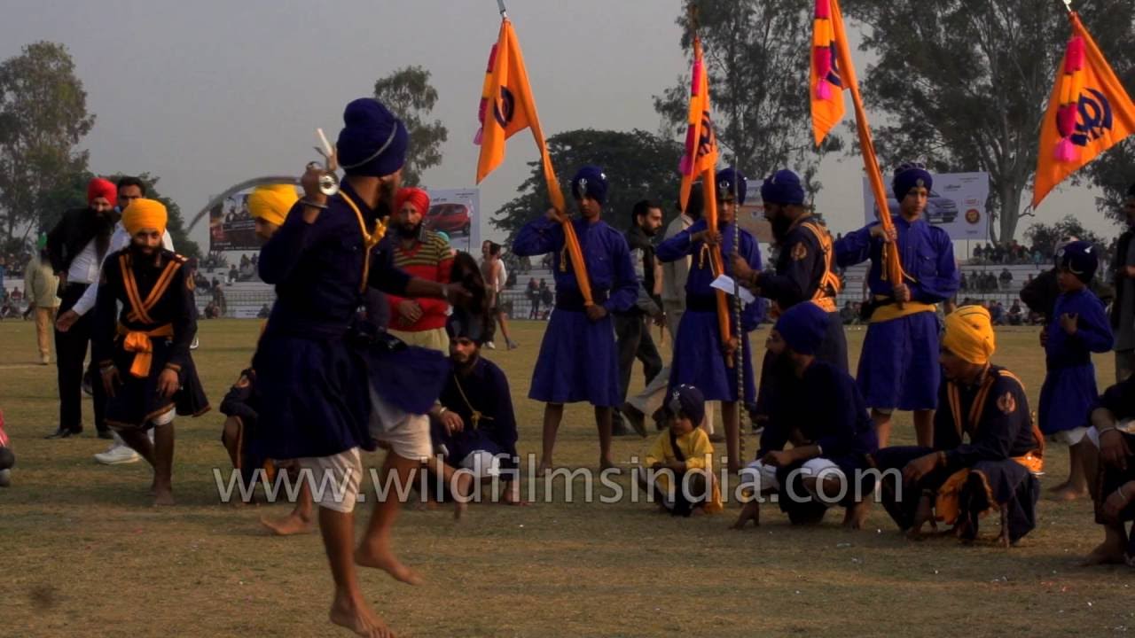 Sikh performs sword-play with shield: Gatka martial art in slow mo