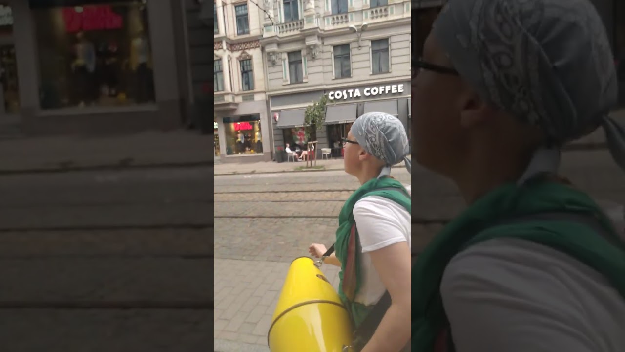 Воспевание Святых имён Бога. Харинама в центре Риги 18 августа 2023 года.(1)