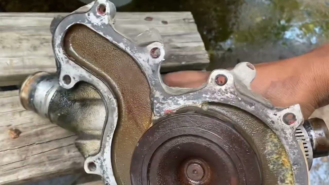 Como cambiar bomba  de agua Ford Explorer sport trac 2001