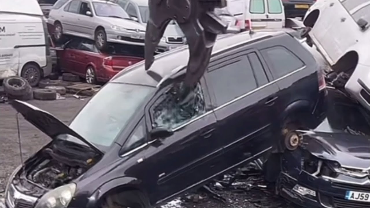The Fascinating Process of Dismantling and Scraping Cars with Specialized Machines