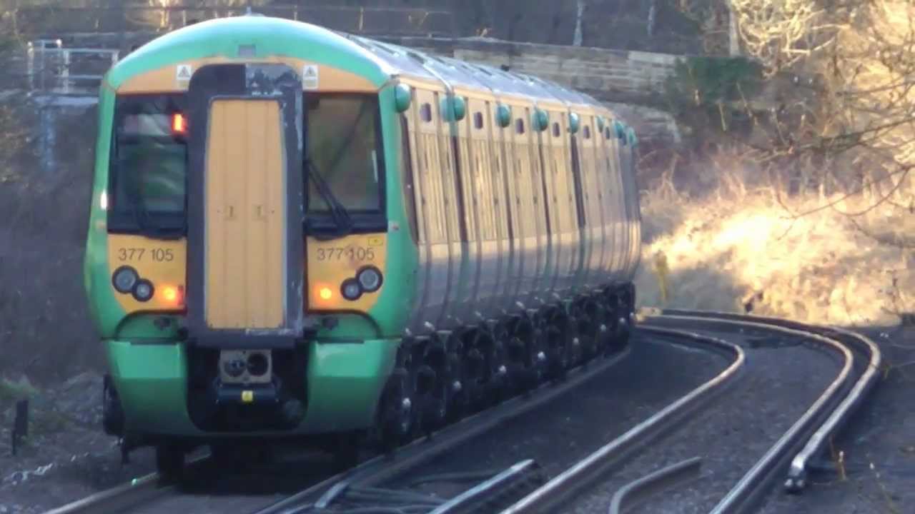 Southern & FCC Trains Passing Balcombe Station On A Sunny Evening