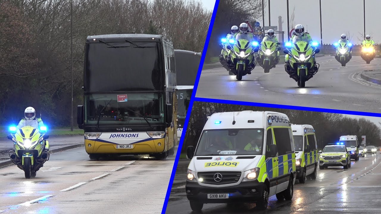 Police escort Southampton football fans to Fratton Park for the South Coast Derby