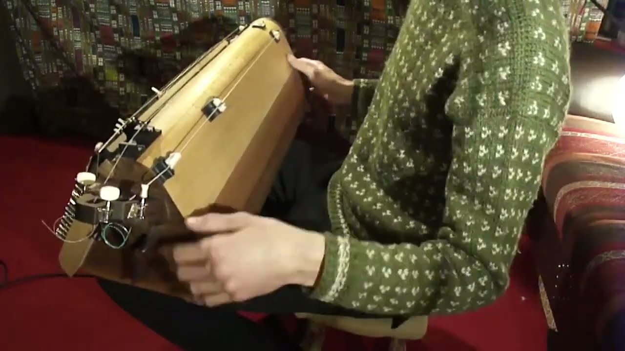 Electroacoustic Mulatar with full key harp