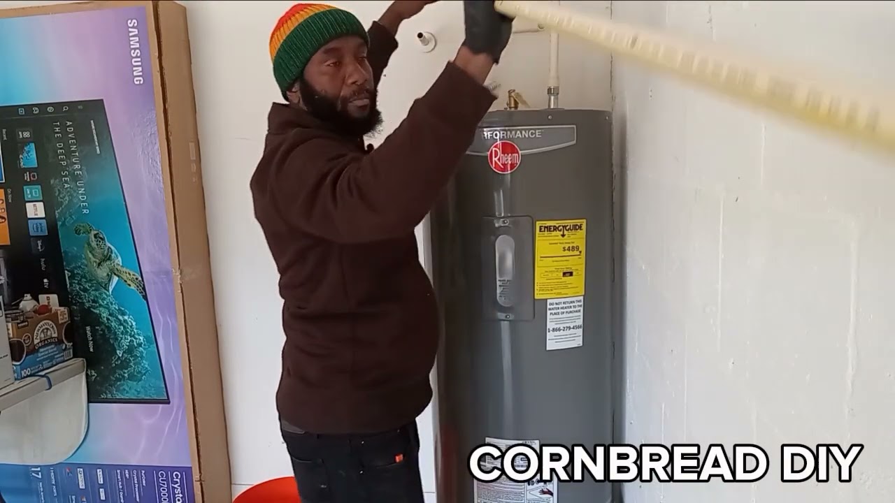 WATCH ME CHANGE THIS HOT WATER TANK LIKE COMMENT AND SHARE