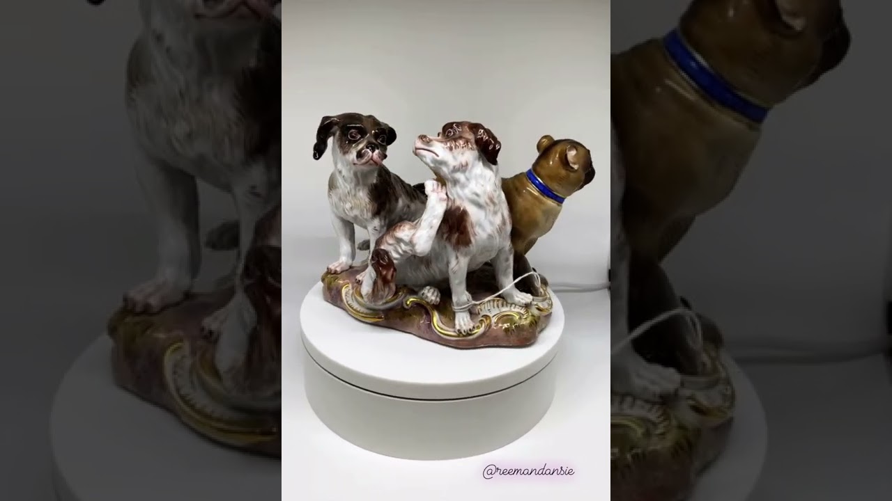 Lot 136 - Meissen porcelain group of dogs