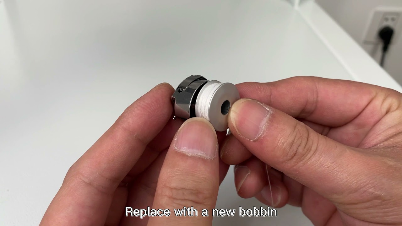 Promaker: placing the Bobbin in the bobbin case, and machine