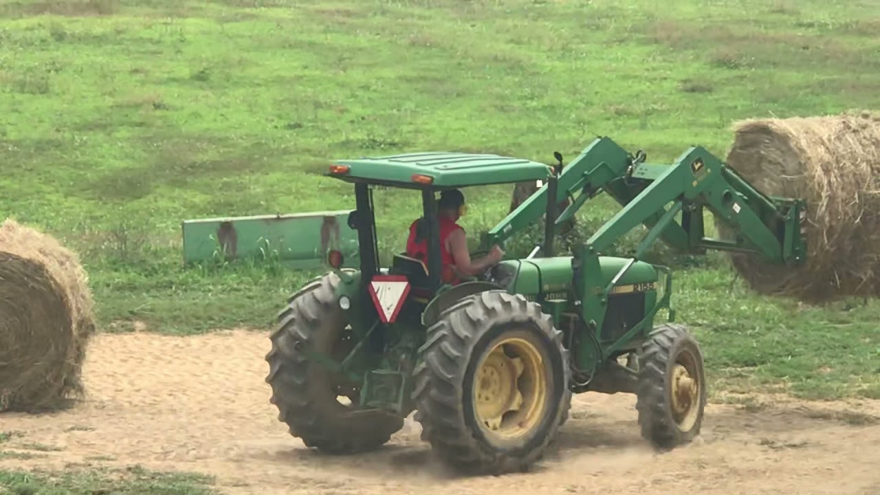 Stacking round bales
