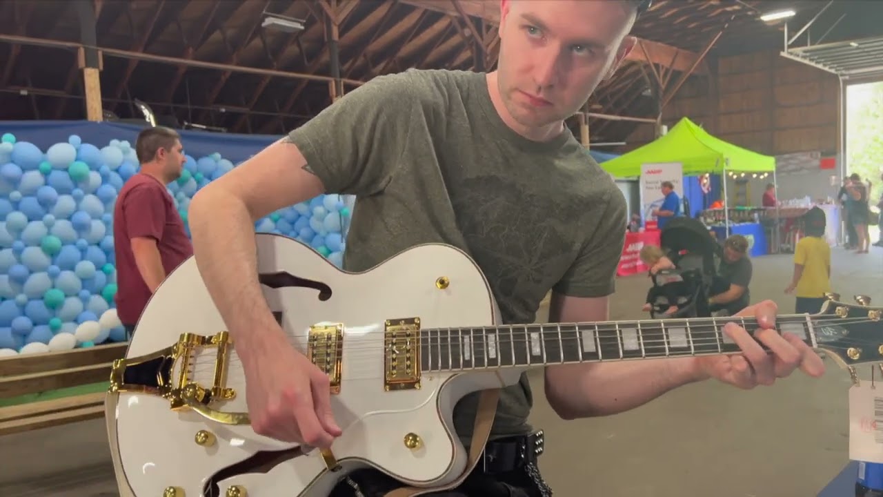 A J  Affronti lead guitarist for Knight Patrol tries out Harley Benton BigTone.