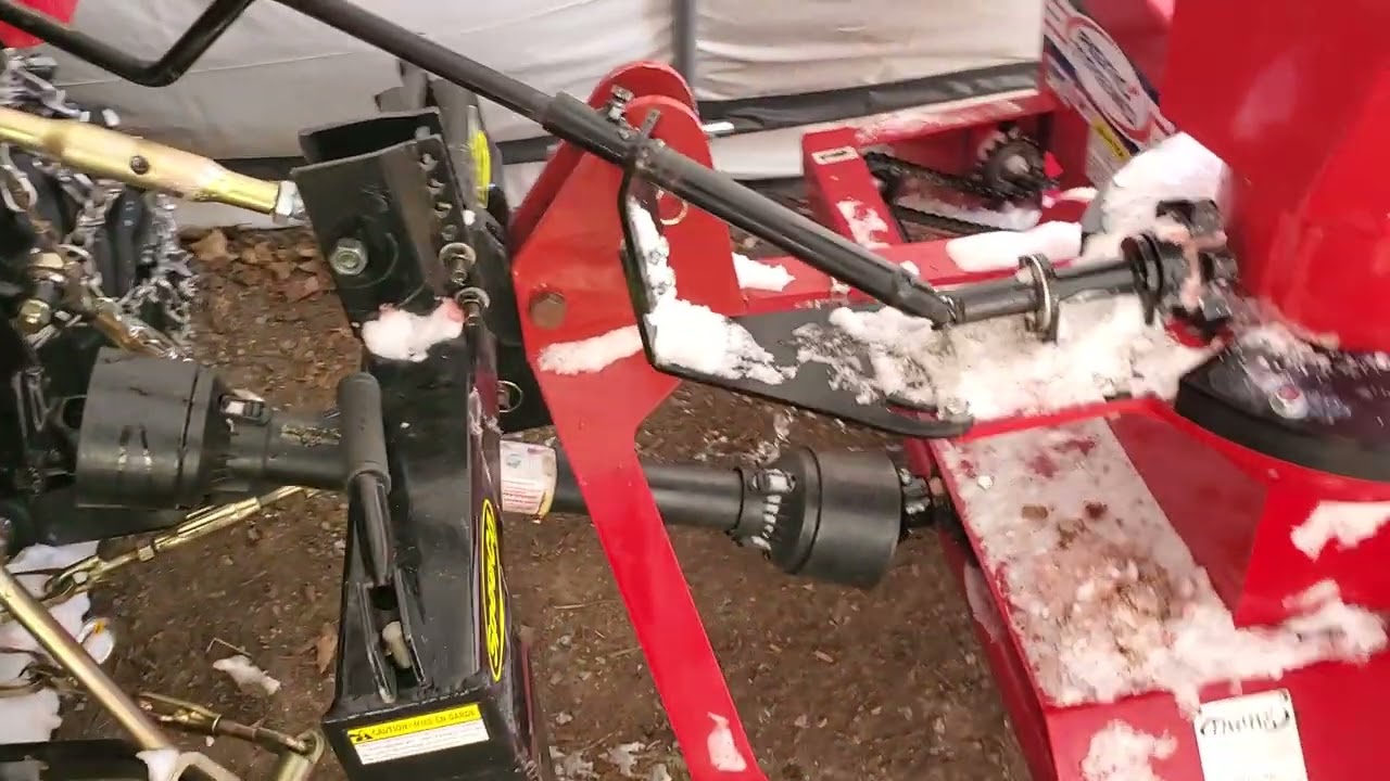 rear mounted vs front mounted snowblower
