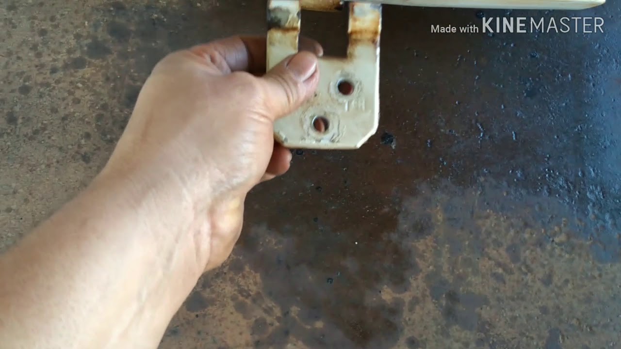 Manutenção na porta traseira da Fiorino