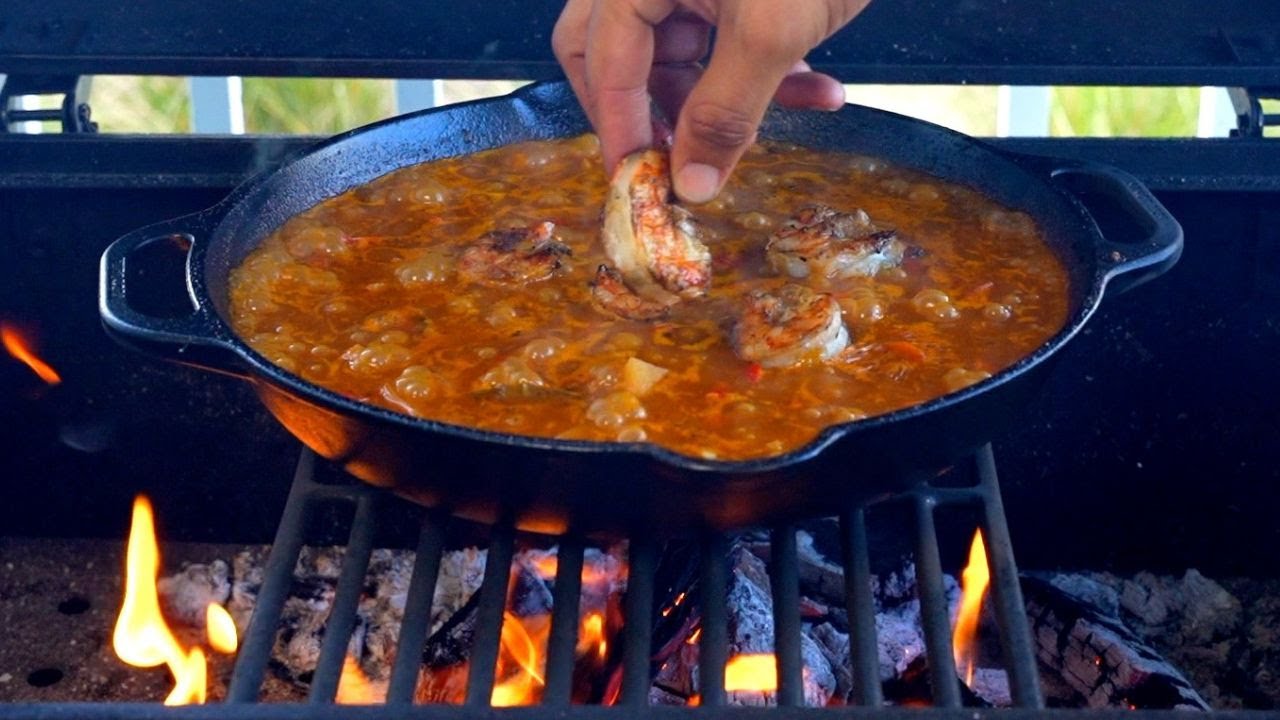 Shrimp and Rice Stew Cooked Over Open Fire
