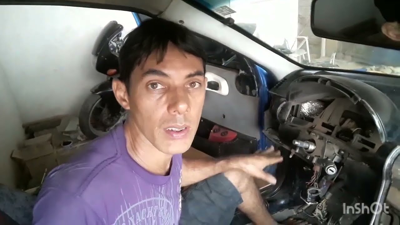 como desmontar o painel do corsa parte 18
