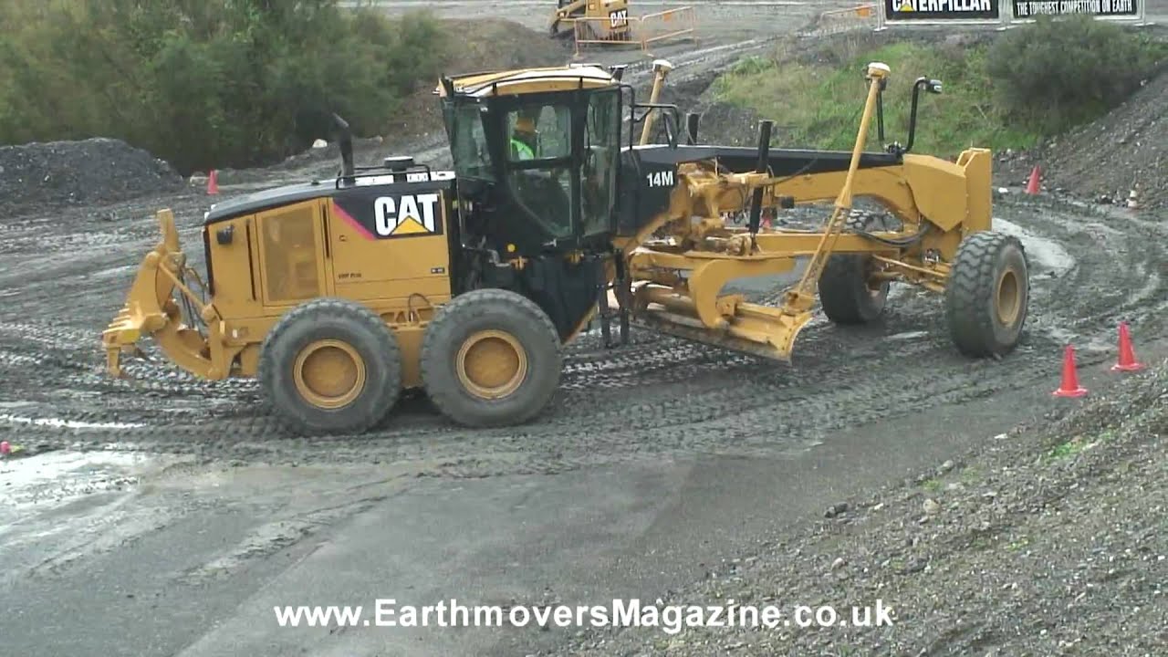 Cat 14M grader test in the rain