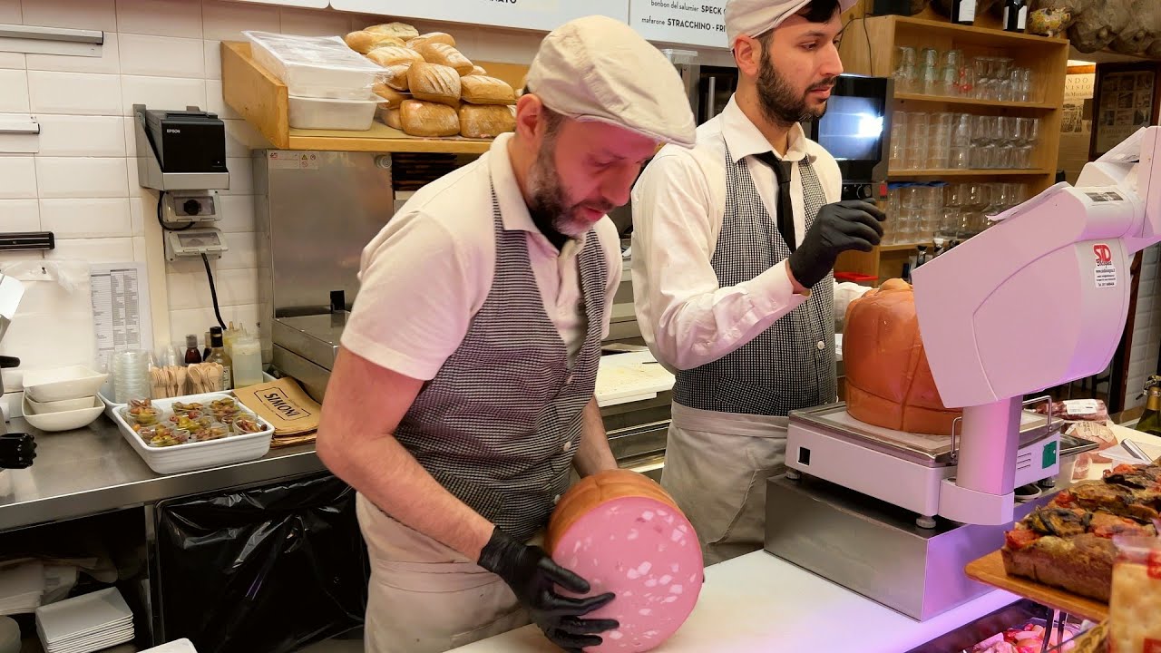 Mortadella in Bologna, Italy. Bologna: a paradise for mortadella lovers!