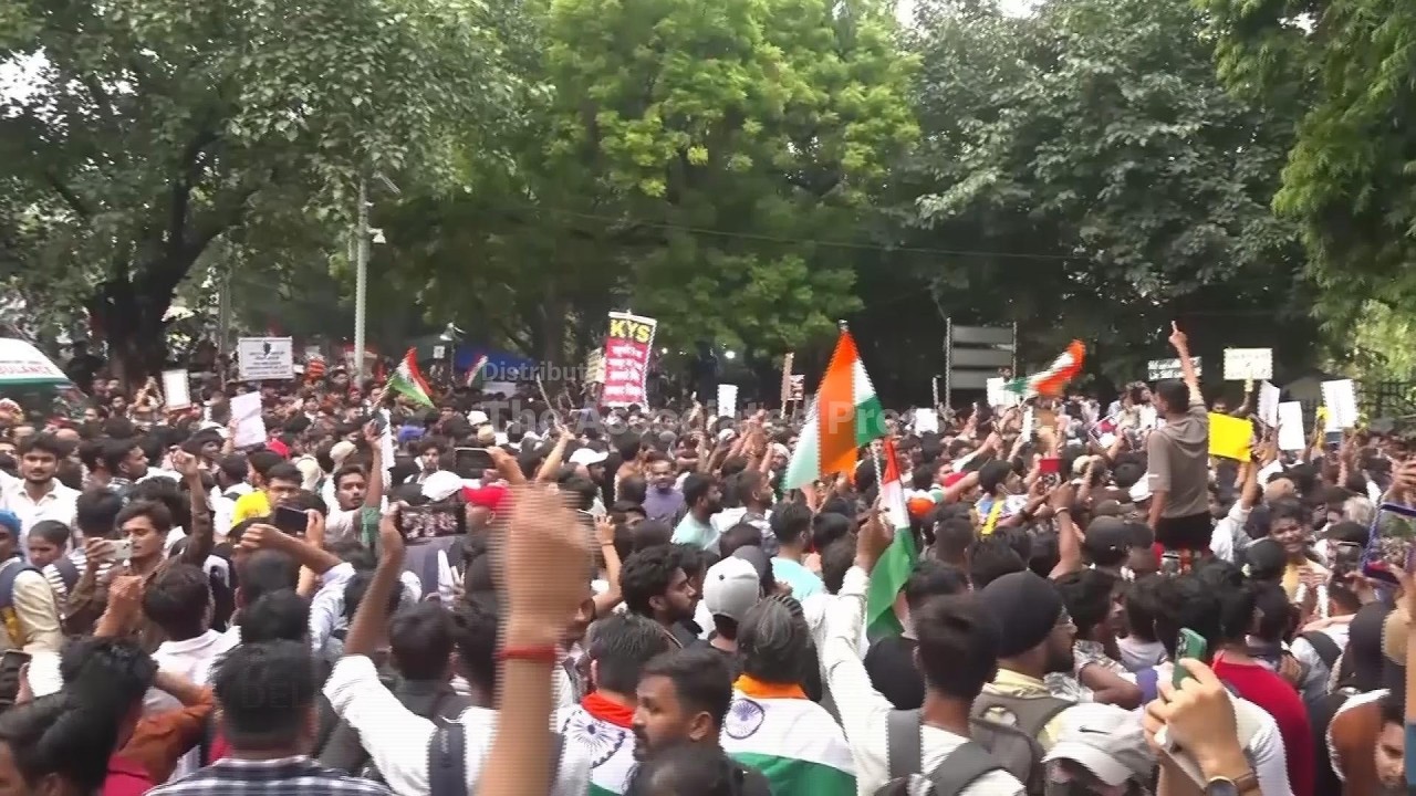 Supporters of the Cockroach movement gather in New Delhi to demand the education minister's resig...