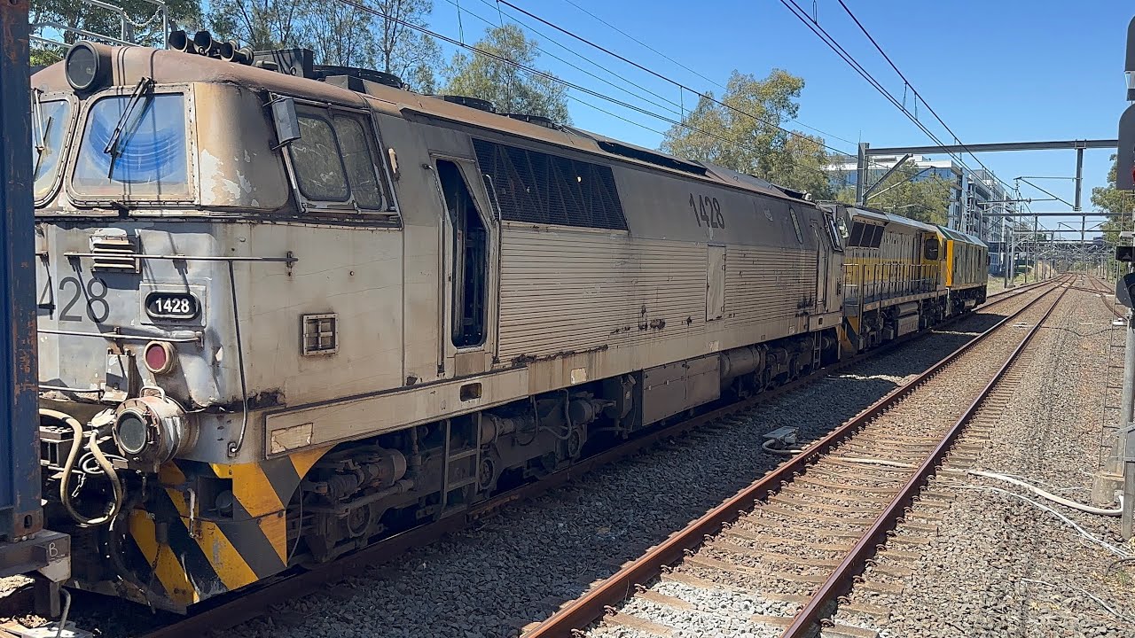 8/1/26 - QUBE 4112 passing Rhodes with RL303, 1101, and 1428