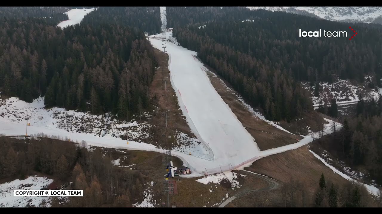 Aprica, l’inverno avaro di neve naturale: la pista del Baradello è una striscia bianca, video drone