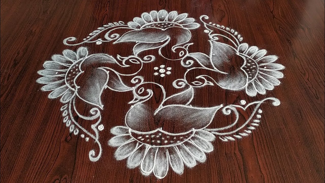 Simple Easy peacocks kolam (9×1) dot's...