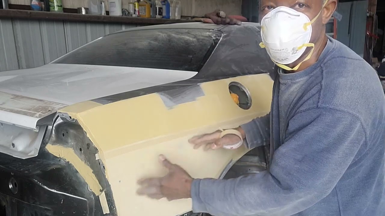 Sanding the Bondo on Quarter Panel and Application of Polyester Putty