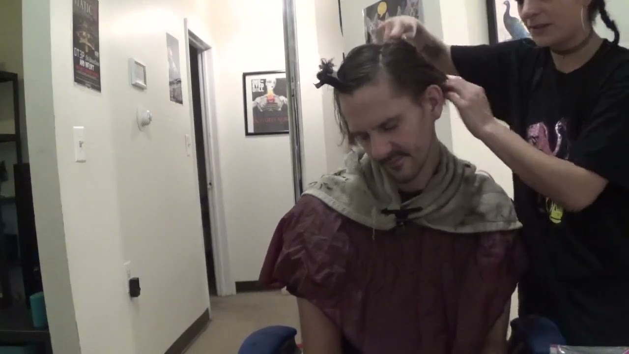 Giving my friend a haircut.