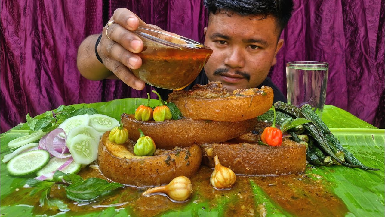 EATING SPICY LOCAL PORK GRAVY WITH BASMATI RICE 