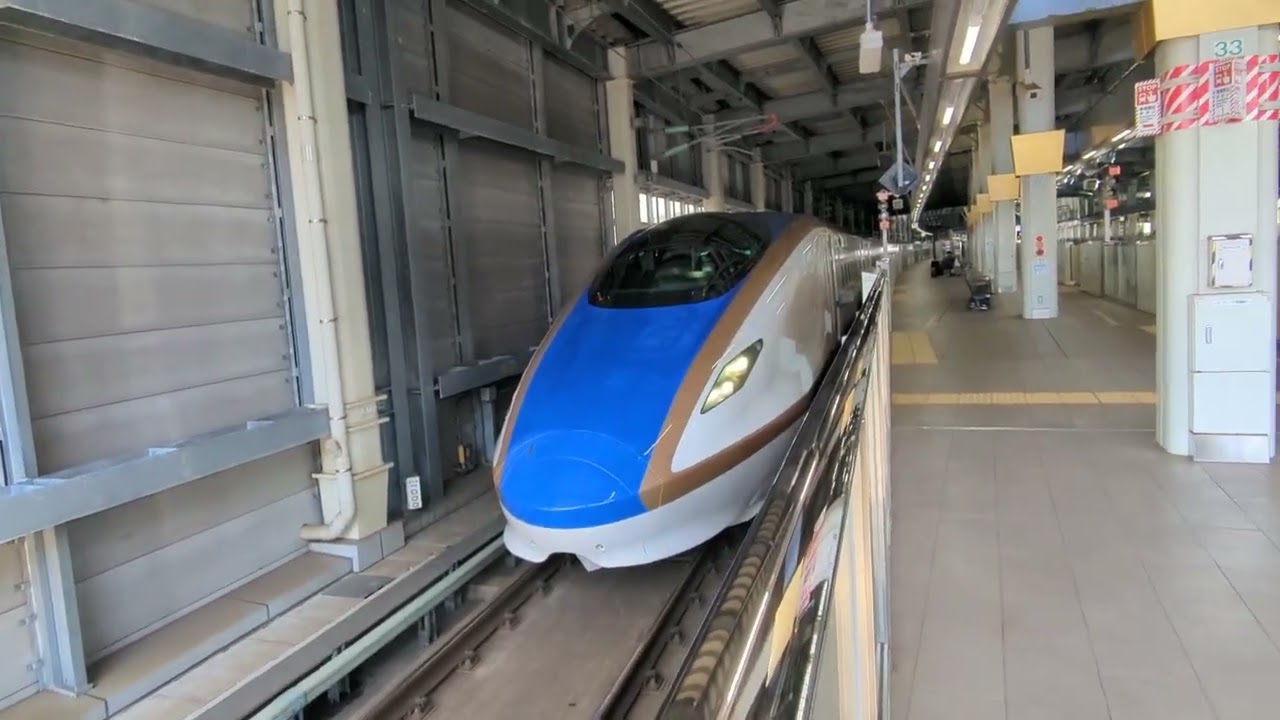 2026年3月12日北陸新幹線金沢(駅)13番のりばW7系W8編成553Eはくたか553号→(回送列車)回送553E 11番のりばE7系F6編成8521Eかがやき521号→(回送列車)回送8521E