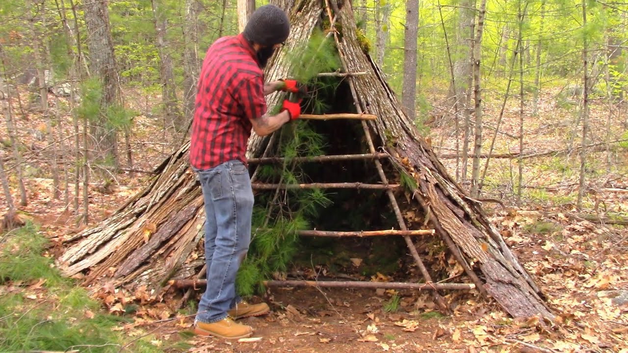 Primitive Survival Shelter build with No Tools part 2 Bed/Door