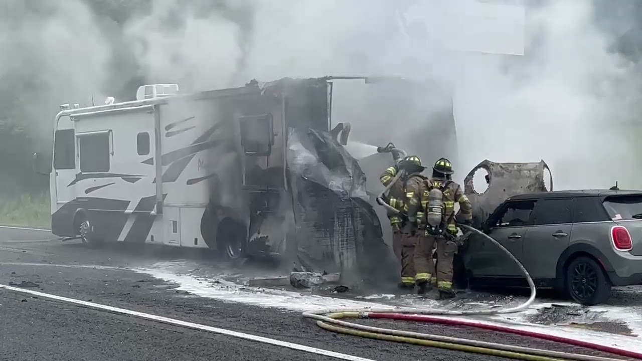 RV towing car catches fire on Interstate 24