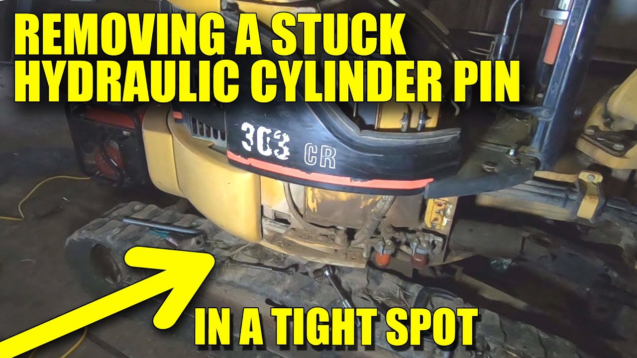 HOW TO REMOVE A STUCK HYDRAULIC CYLINDER PIN | CAT MINI EXCAVATOR