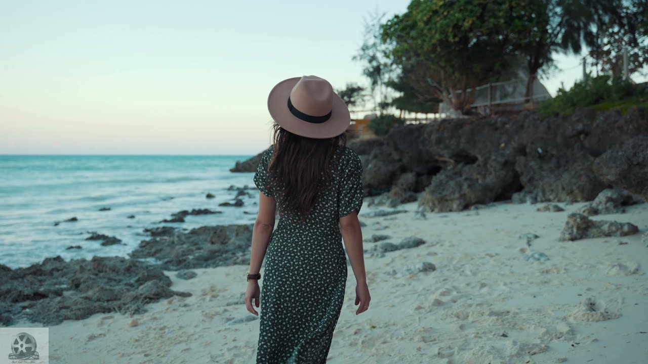 Loneliness-A Lonely Woman Walking Alone On Beach