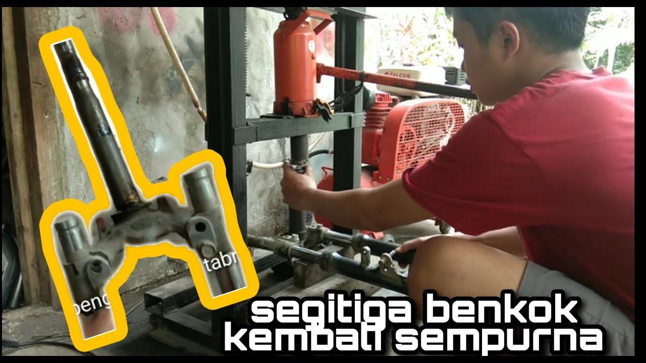 Cara pres segitiga kemudi sepeda motor mengunakan hidrolik pres