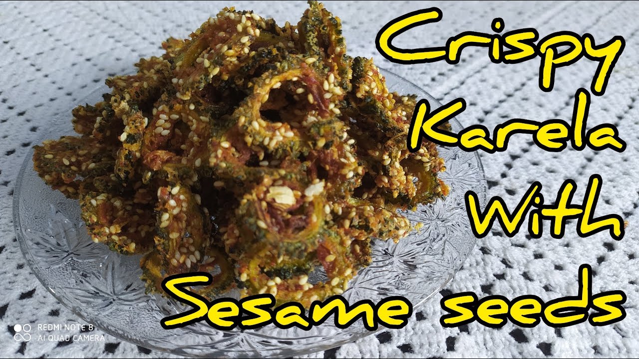 CRISPY KARELA WITH SESAME SEEDS. कुरकुरे करेला सेतो तील संग।