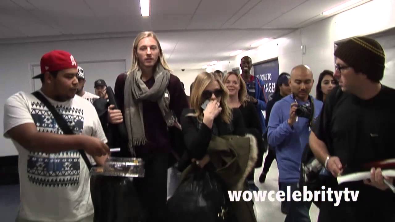 Chloe Moretz spotted at Lax Airport mobbed by Autograph Seekers