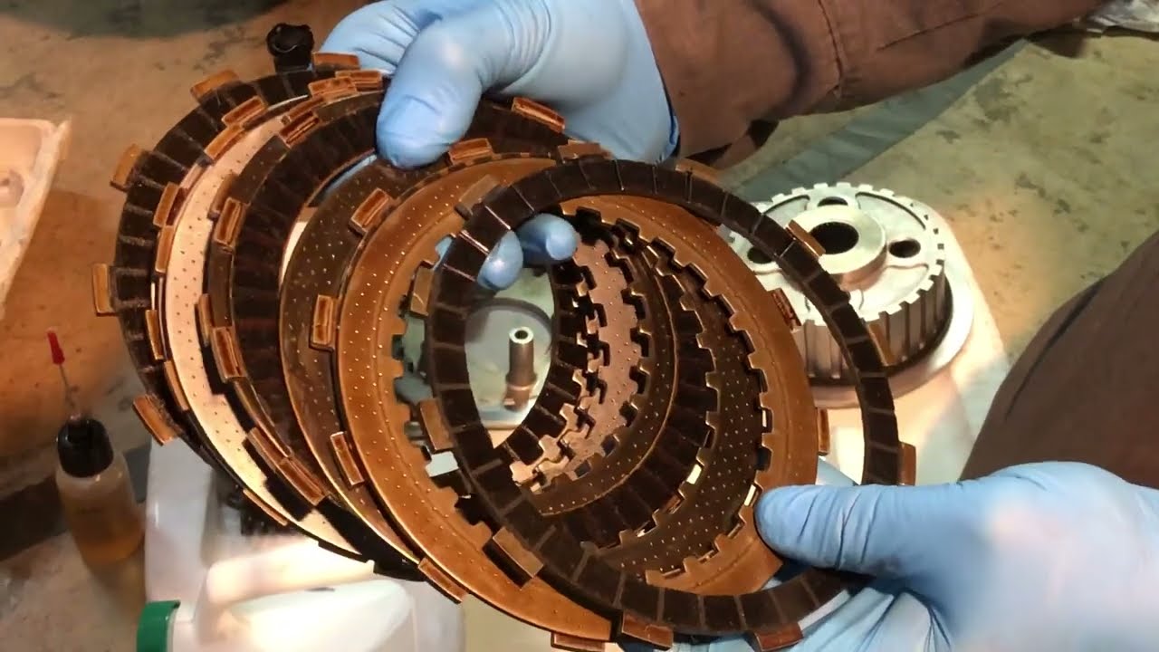 Honda CB750 Nighthawk Clutch Replacement (Part 5/11) -- inspecting the clutch plates