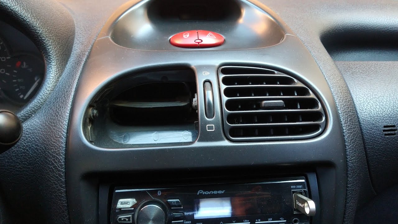 Cómo sacar y limpiar rejillas de calefacción en Peugeot 206