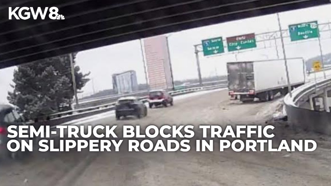 Semi-truck caught on camera struggling in snowy conditions on I-84 in downtown Portland