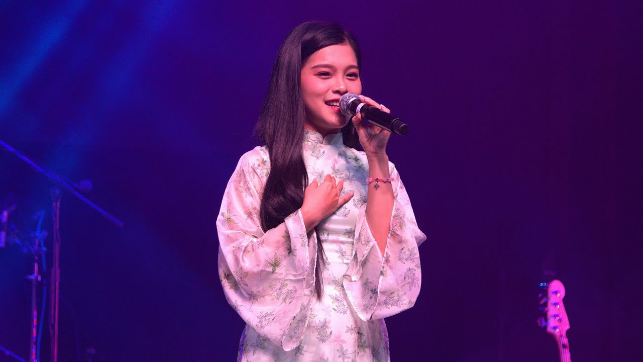 Pham Tuyet Nhung performs the song 