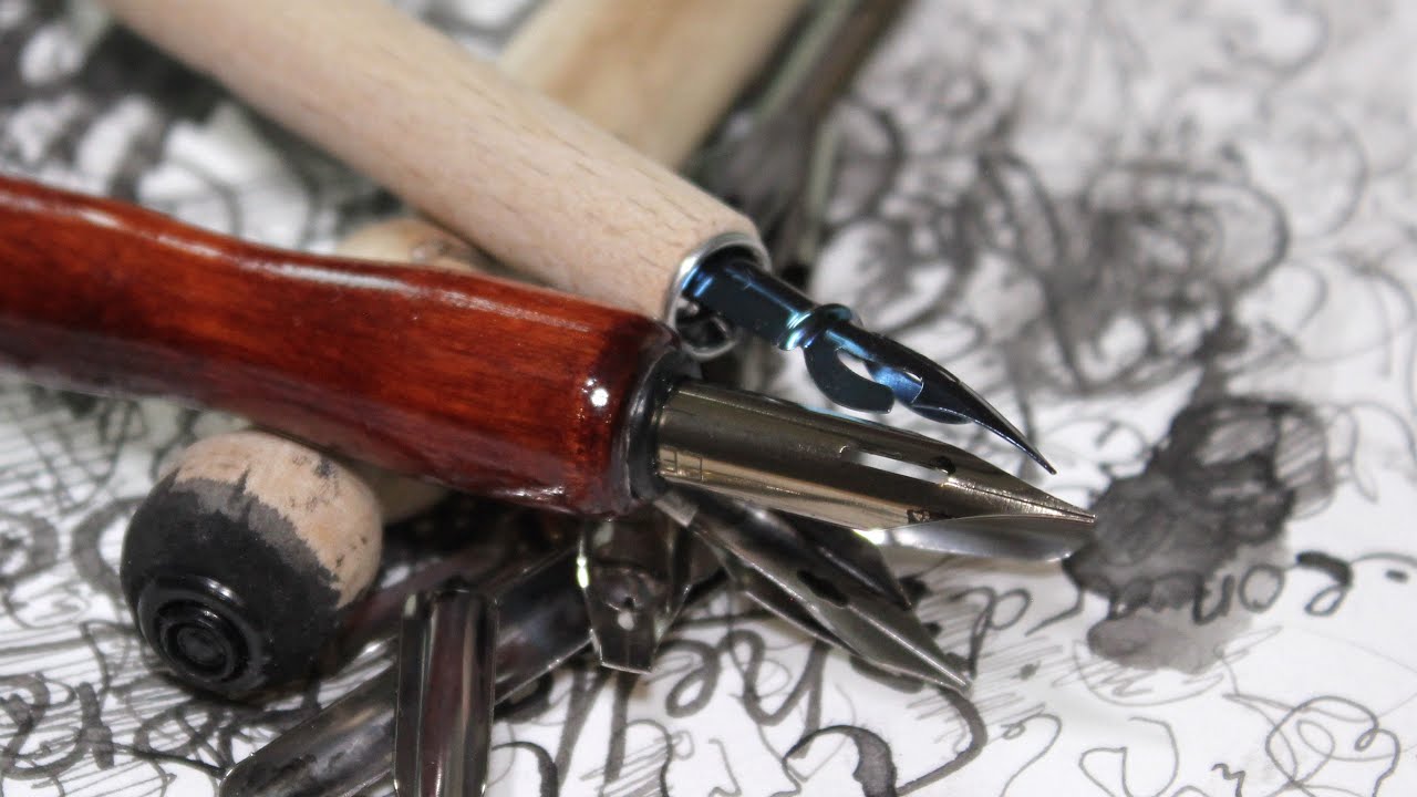 Two D Leonardt dip pen nibs (also Mont Marte dip pens) something drawing
