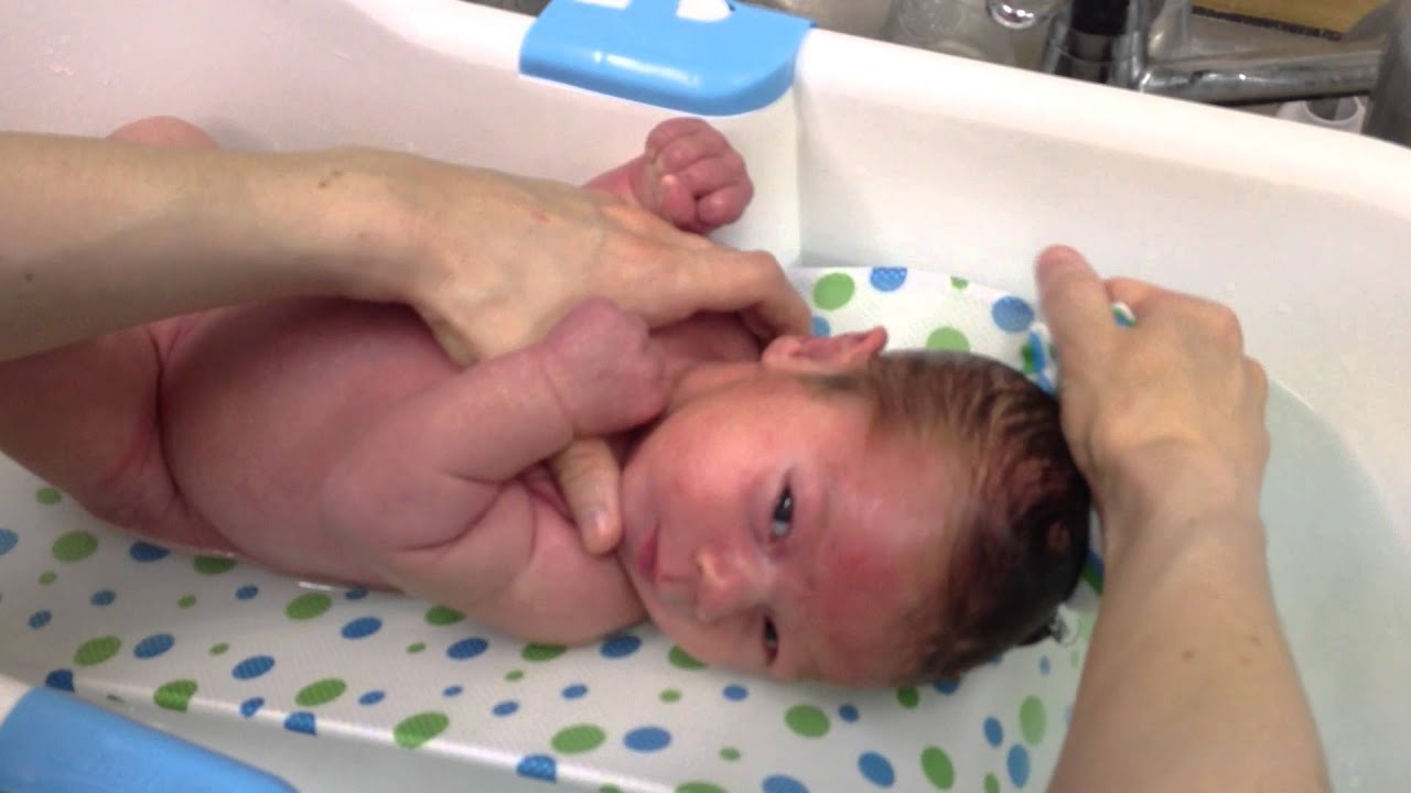 24-day-old Xavier's 1st full bath in water on 4-10-13