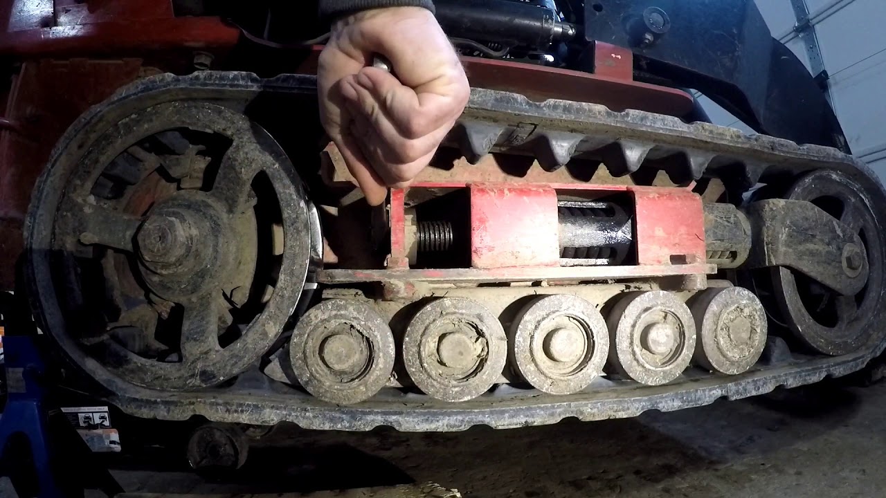 Toro Dingo TX420 how to change the tracks.