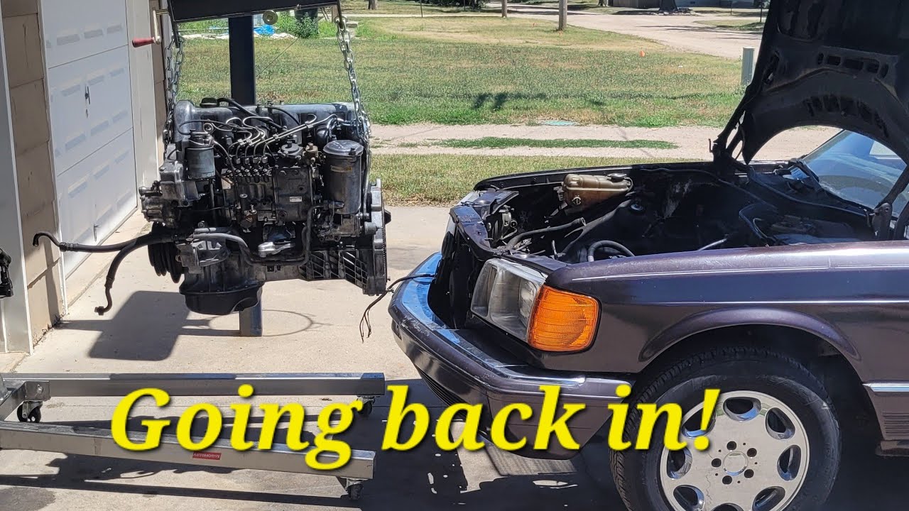 Installing the engine back into the 300sd!