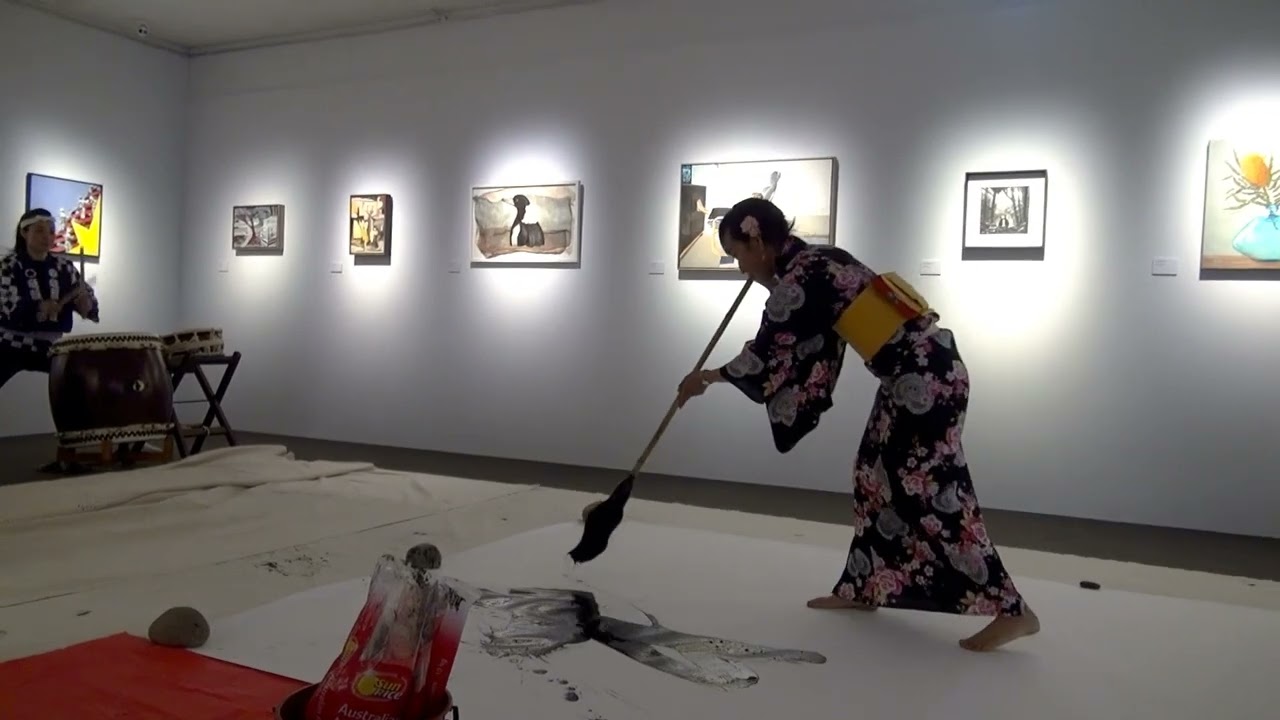 Japanese calligraphy performance by Tomoko Oka