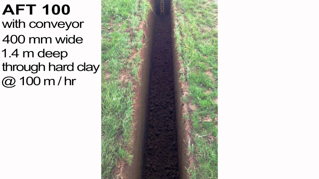 AFT 100 with conveyor digging trench 400mm wide 1.4m deep http://www.trenchers.co.uk