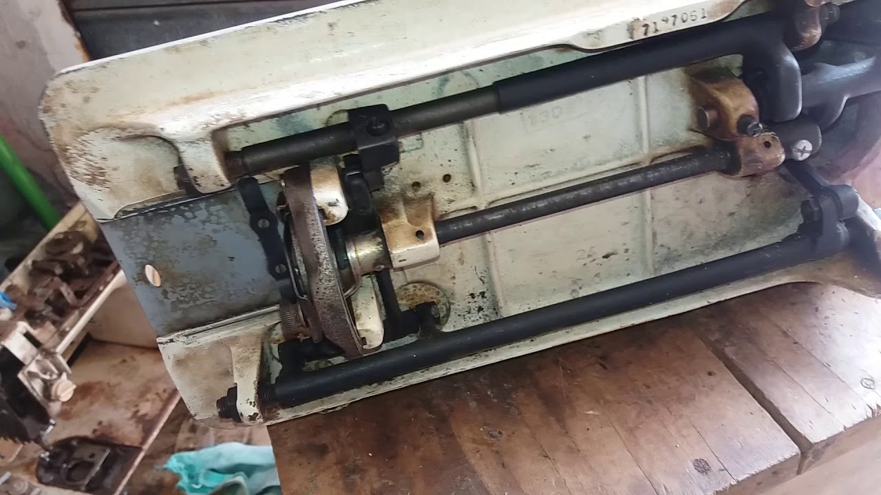 Singer ponto ouro 660 Antiga como regular o tempo.