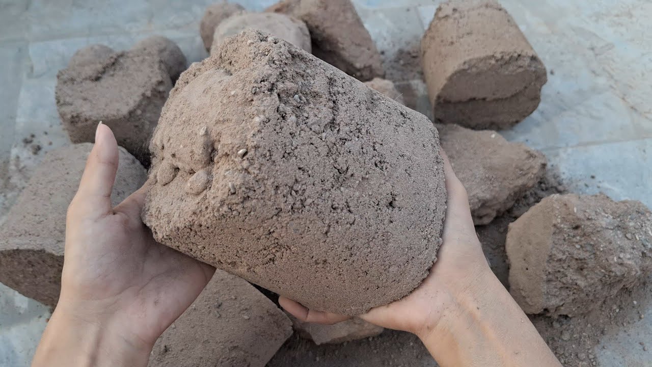 New video Brown grainy dry floor crumbling satisfying 
