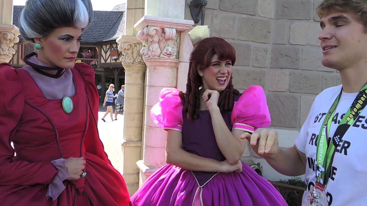 Anastasia and Drizella stretch and sing with Tommy after his Half Marathon at Disney World