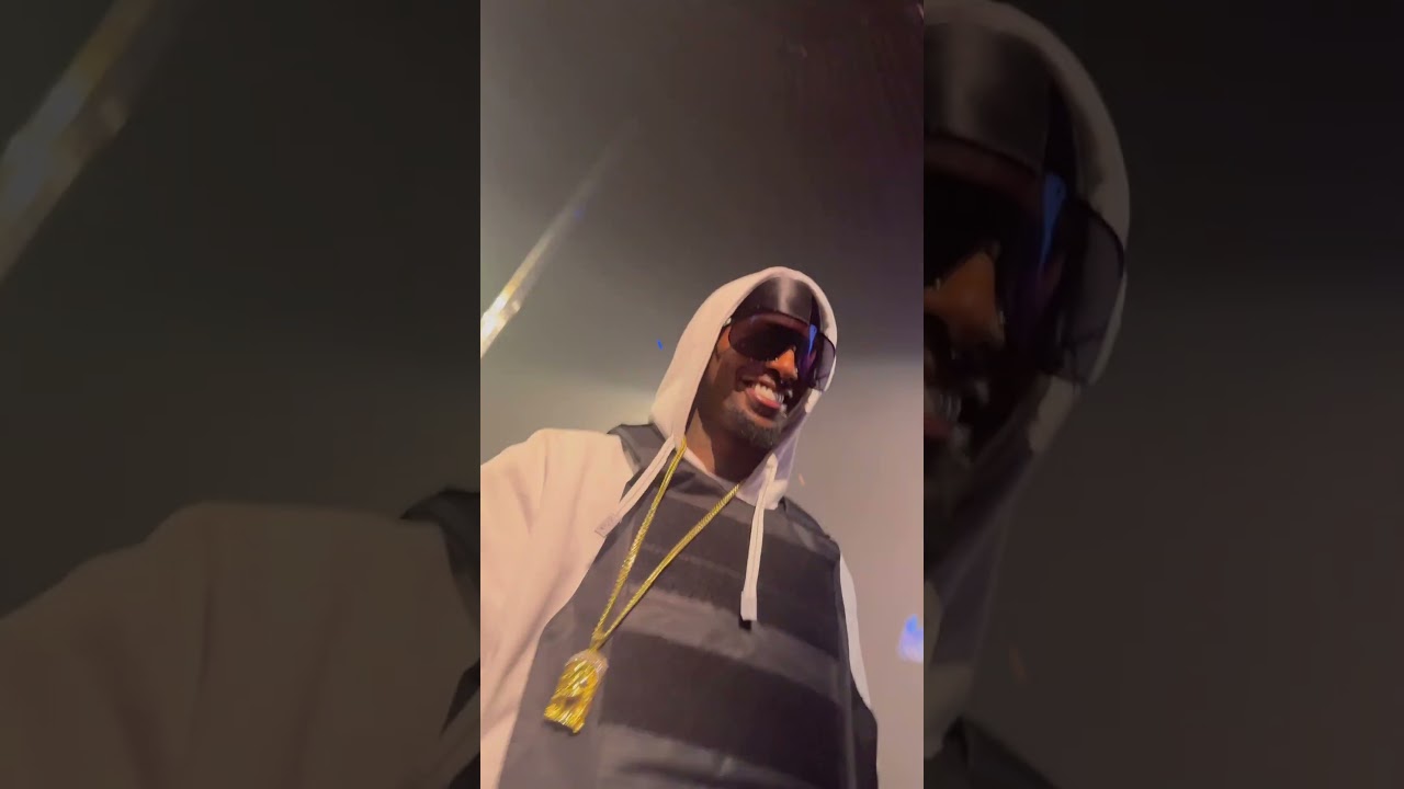 Playboi Carti interacting with a fan